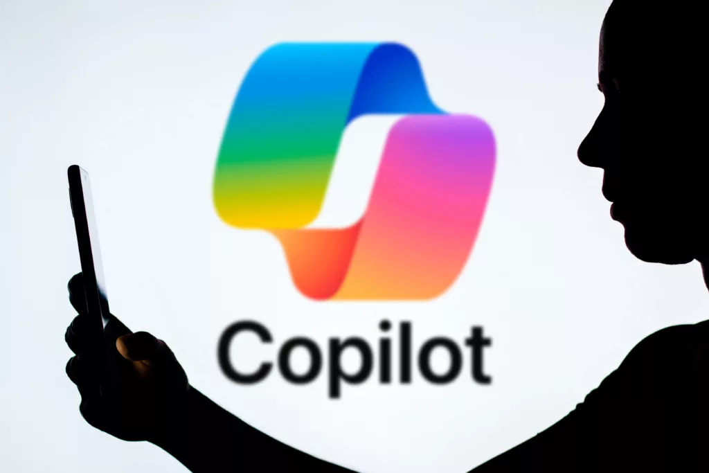 Manager using Microsoft 365 Copilot to improve team productivity
